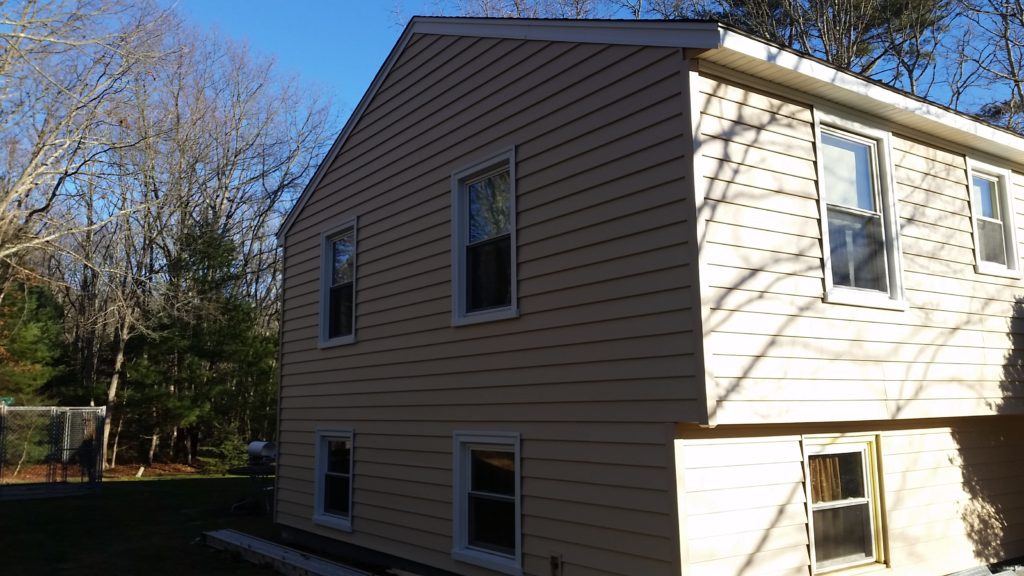 home exterior after new vinyl siding applied